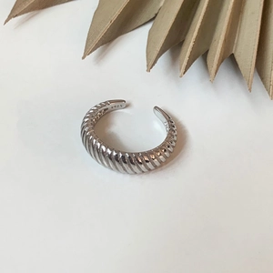 Detailed view of S925 sterling silver croissant textured ring with adjustable open band