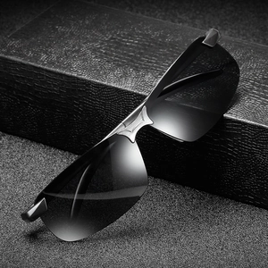 Men's day and night driving sunglasses with rimless grey lenses and silver metal bridge