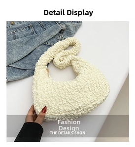Detail of off-white bubble textured hobo bag featuring dense pleats and soft fabric surface