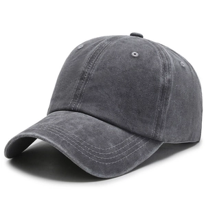 Detail view of washed cotton baseball cap in charcoal grey with premium stitching