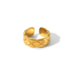 Detailed view of golden stainless steel ring featuring textured quilted pattern and open design