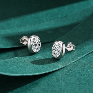 Retro S925 sterling silver oval stud earrings with bezel-set cubic zirconia stones