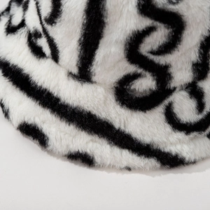 Striped plush bucket hat for women and men featuring fuzzy faux fur and black patterns