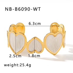 Detail view showing dimensions of a gold heart-shaped stainless steel open bracelet