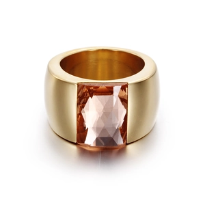 Elegant gold-plated wide band ring featuring a large rectangular champagne crystal stone