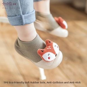 Detail of baby sock shoes with TPE anti-collision rubber sole and cute fox decoration