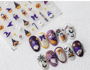 Detailed view of 3D Halloween nail stickers with embossed pumpkin and ghost designs