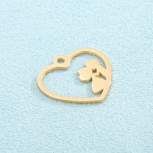 Golden heart stainless steel pendant featuring a romantic couple silhouette cutout design