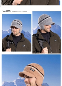 Close-up of knit winter hat with ear flaps and visor showing thick textured wool material