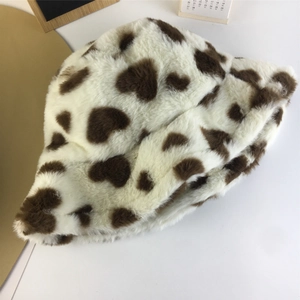 Detailed view of soft plush faux fur texture with heart leopard print on winter bucket hat