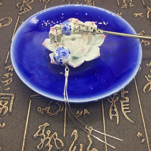 Classic Chinese blue and white ceramic hair pin with tassels and butterfly detail