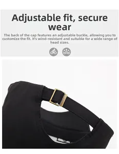 Détail de la boucle métallique réglable sur casquette en coton noir pour un ajustement