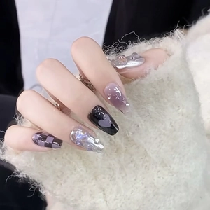 Black and purple checkerboard heart press-on nails with 3D metallic silver textures