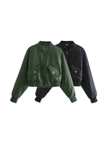 Detail of satin flight jackets in dark green and black colors with ribbed cuffs