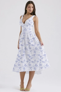 Detailed close-up of slim fit white floral dress with V-neck and elegant blue print