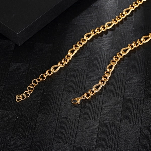 Detail view of gold-tone titanium steel mesh necklace with extender and lobster clasp