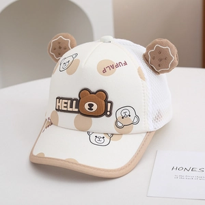 Detail showing cartoon bear ears and breathable mesh fabric on a baby baseball cap