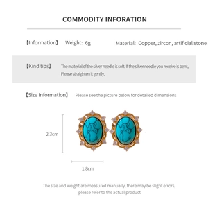 Detail view showing oval floral earrings size specifications and vintage material details