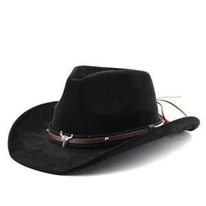 Detail of black western cowboy hat with brown braided leather band and silver bull skull