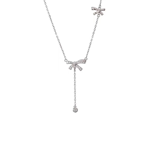 Silver S925 sterling silver bow necklace with zircon tassel pendant in a Y-shaped design