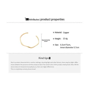 Detail showing 18k gold plated honeycomb bangle dimensions and 15.4g weight