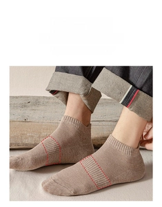 Detail of light brown cotton ankle sock with ribbed arch support for a secure non-slip fit