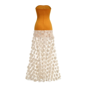 Detail of yellow tube top dress with white mesh拼接 and 3D circular applique decorations