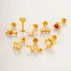 G23 titanium body jewelry set featuring heart, snake, and crown designs with clear crystals