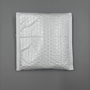 Macro shot of white bubble mailer envelope with protective shockproof texture for shipping