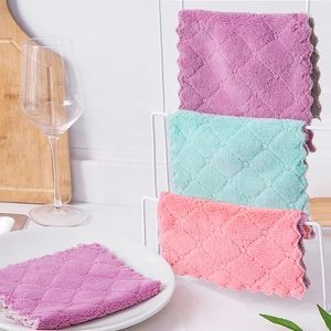 Thick absorbent dishcloths in purple green and pink featuring a wave edge design