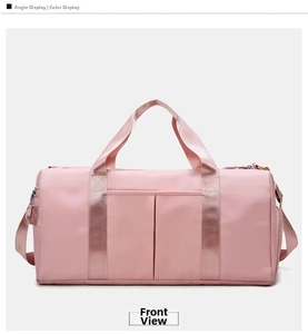 Front view of large pink yoga gym bag with waterproof fabric and double front pockets