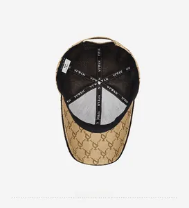 Detailed interior of a baseball cap featuring breathable black mesh and logo branding tape