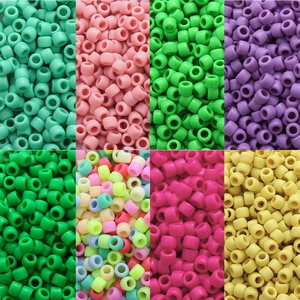 Macro detail of colorful large hole acrylic pony beads for DIY bracelet making projects