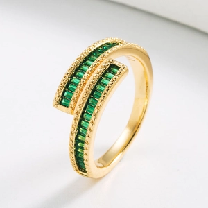 Modern 18K gold-plated bypass ring with emerald green rectangular cubic zirconia stones