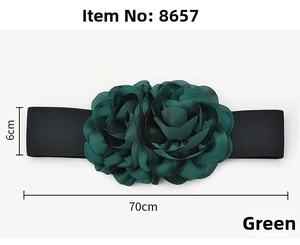 Detail of 6cm wide dark green elastic waist belt with fabric flower decoration