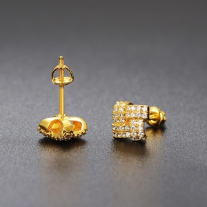 Detailed view of gold square stud earrings with pave zircon and secure screw-back design