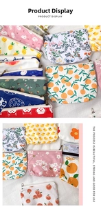 Detailed view of canvas mini purses featuring diverse floral and animal print patterns