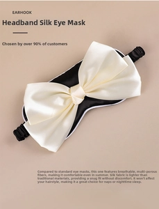 Detail view of the smooth silk texture and elegant bow on this blackout sleep eye mask