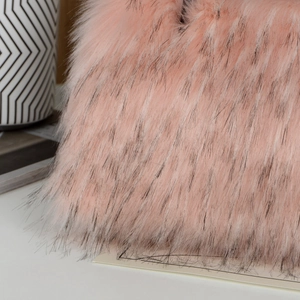 Detailed macro view of soft pink faux fur material with black tips on a large tote bag
