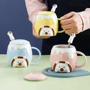 Cartoon ceramic mugs with cute hedgehog designs including matching lids and spoons