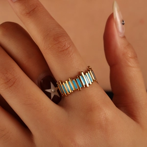 18k gold plated stainless steel open ring with blue enamel stripes on a finger