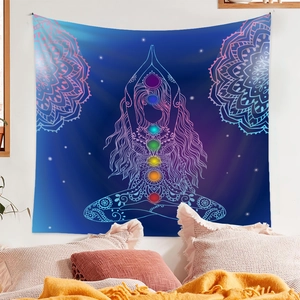 Detailed view of Seven Chakras tapestry hanging above bed in a cozy bedroom
