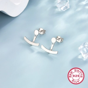 Detail view of S925 sterling silver curved earrings with 925 authenticity hallmark engraving