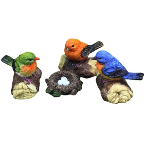 Set of four miniature resin bird figurines and nest for garden and home decoration