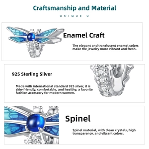Detailed view of 925 silver dragonfly bead with blue enamel wings and spinel stone