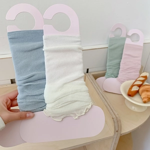 Pastel ballet-style ribbed leg warmers in breathable mesh knit for women's spring fashion