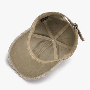 Retro distressed cotton baseball cap in khaki with frayed edges and inner detail