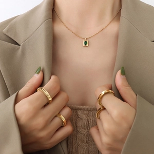 French style 18K gold plated bead chain necklace with oval green zircon stone and woven rings