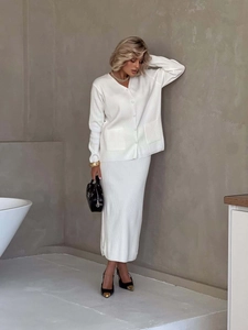 Minimalist white two-piece knit set with long sleeve V-neck cardigan and midi pencil skirt