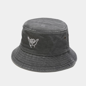Close-up of finger embroidery and breathable eyelets on dark grey cotton bucket hat